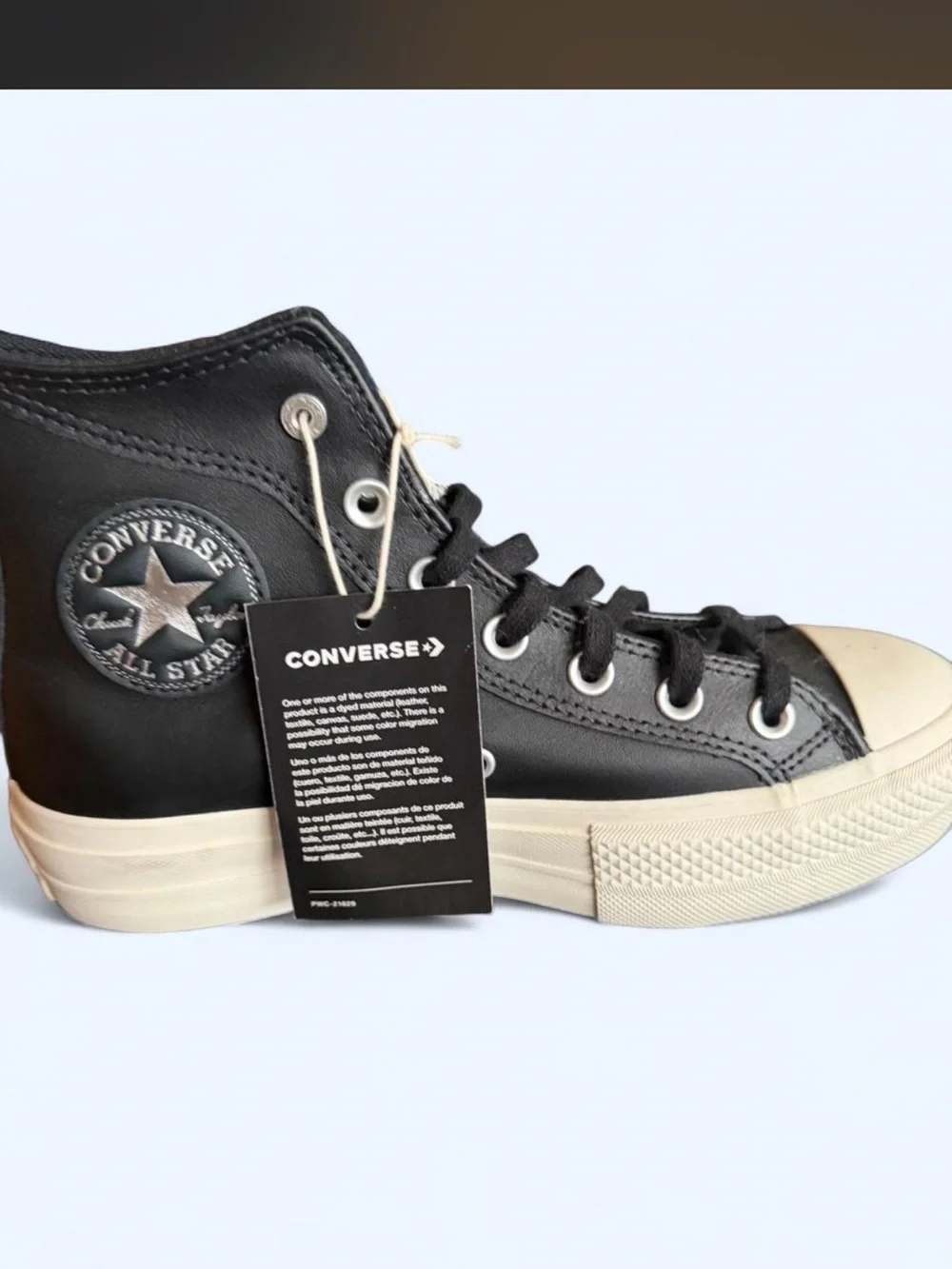 Black High-Top Sneaker with Ivory Sole